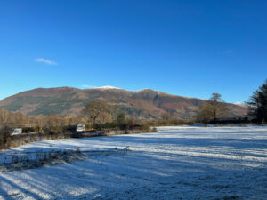 Snow on Skiddaw viewed from the main camping field at Lanefoot Farm Campsite